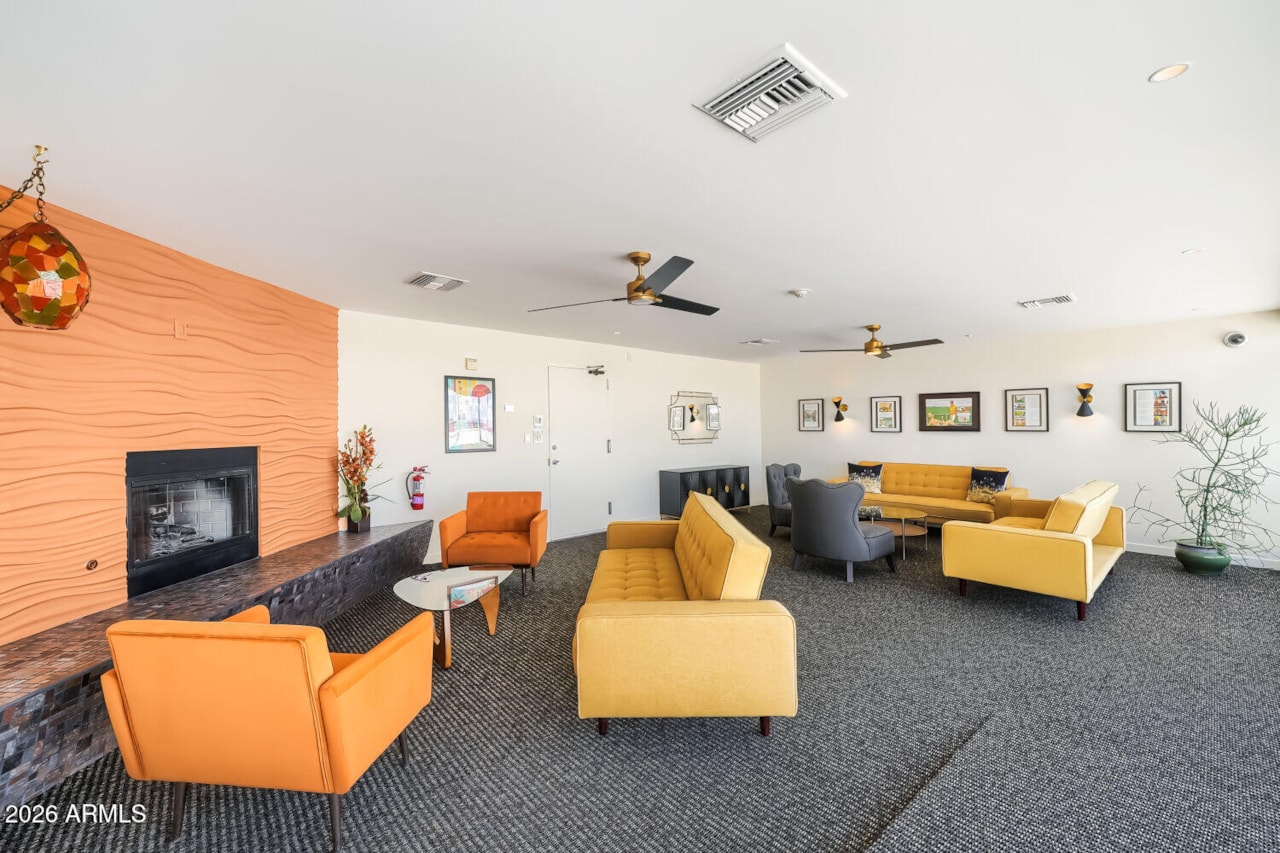 17th-floor lounge with fireplace and mid-century furnishings